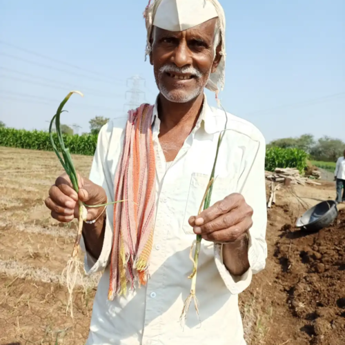 A farmer who uses BioPrime AgriSolutions products